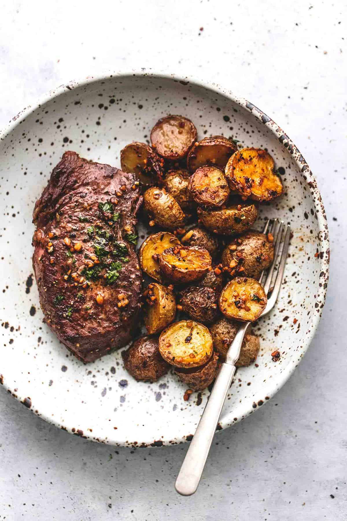 1855 Beef Ribeye Steak with Garlic Skillet Potatoes Recipe