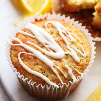 up close muffin with glaze and lemon wedges