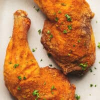 two air fryer chicken legs on plate