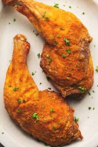 two air fryer chicken legs on plate