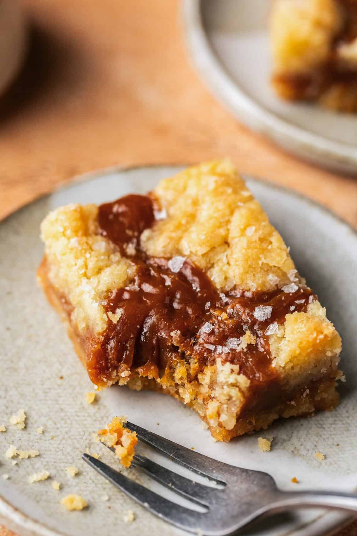 caramel cookie bar with bite missing