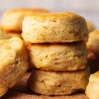 stack of three biscuits on parchment paper