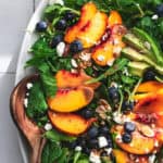 nectarine peach blueberry salad with almonds, blueberries, and balsamic dressing on plate