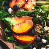 up close view of peaches, lettuce, blueberries, almonds