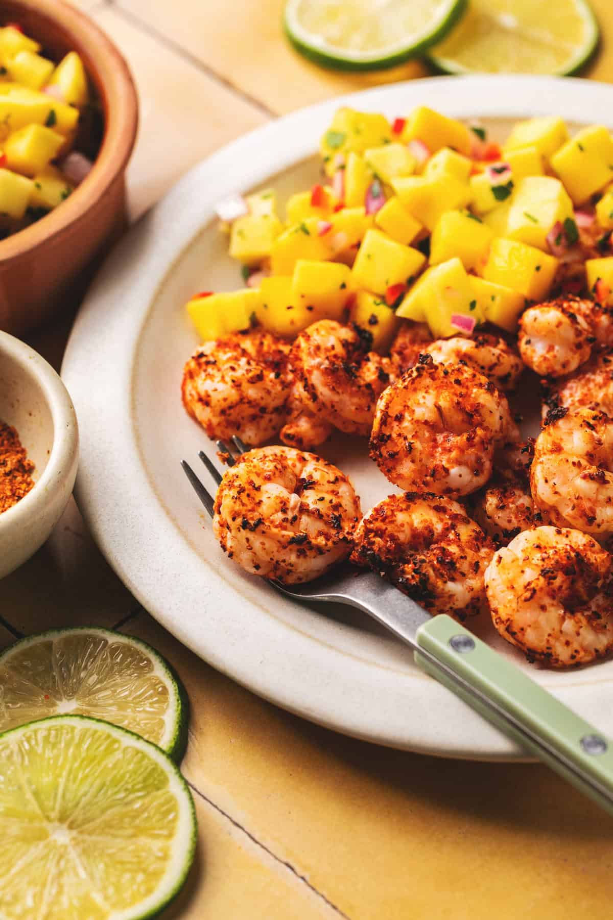 plate of shrimp and diced mangoes