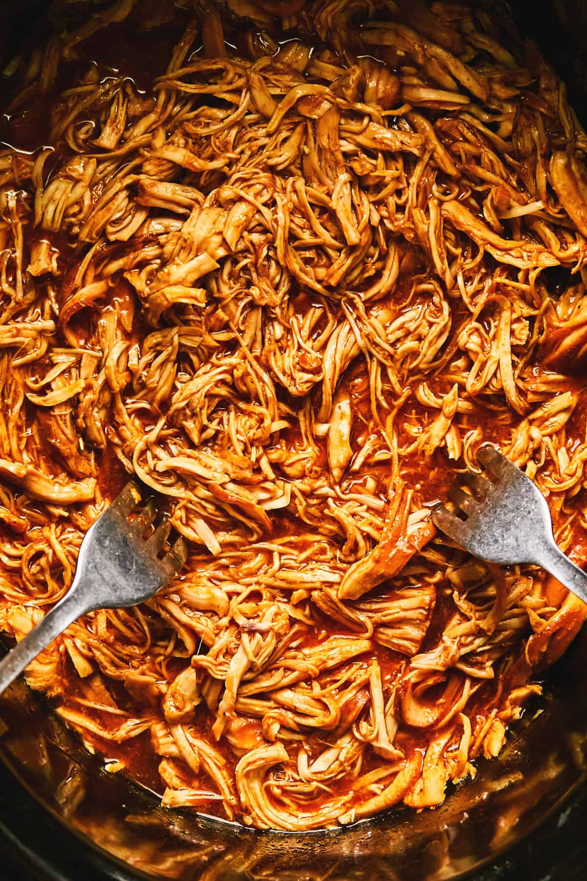 shredded chicken in bbq sauce in slow cooker