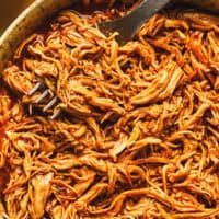 shredded hawaiian bbq chicken with fork in bowl