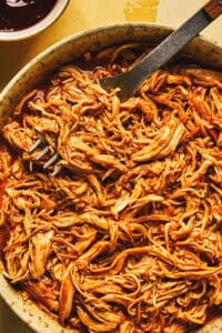 shredded hawaiian bbq chicken with fork in bowl