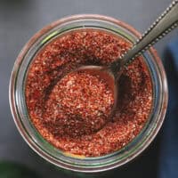 fajita seasoning in jar with spoon