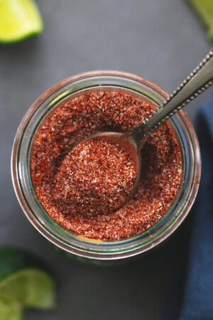 fajita seasoning in jar with spoon